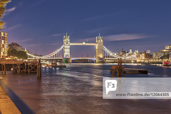 Tower Bridge and London city at night  England