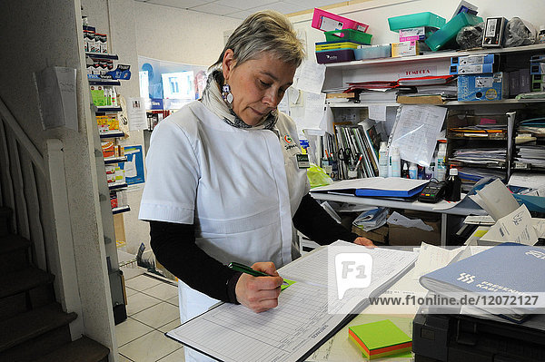 Reportage in a pharmacy in Auxi-le-Château  France. Register of substances and medication classed as narcotics.