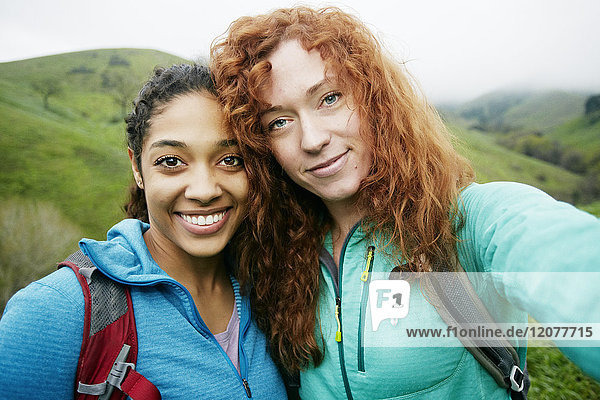 Portrait of smiling women hiking