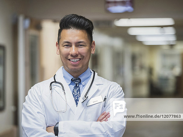 Portrait of confident Filipino doctor