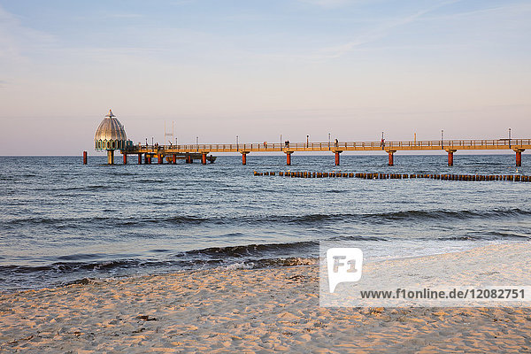 Germany  Zingst  view to submarine gondola and boardwalk at twilight