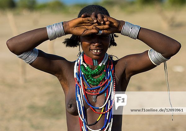 Portrait of an Erbore tribe woman protecting from the sun  Omo valley  Murale  Ethiopia.