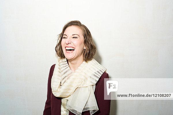 Portrait of woman laughing