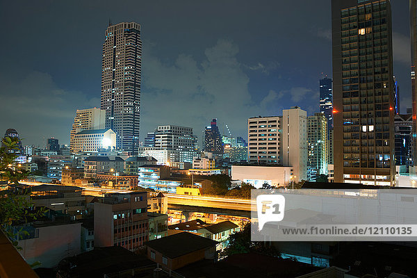 Cityscape with skyscraper skyline at night  Bangkok  Thailand