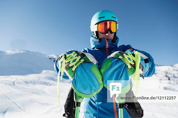 Portrait of skier in snow  front view