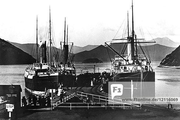 Magic lantern slide circa 1900.Victorian/Edwardian social history  Thw warf  Picton New Zealand with ships tied to the pier.