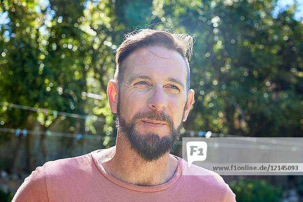 Portrait of bearded man outdoors