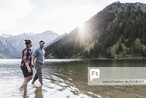 Austria  Tyrol  hiking couple refreshing in mountain lake