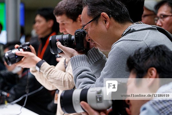 March 3,  2018,  Yokohama,  Japan - Visitors try out the new camera Sony a7 III at the CP+ Camera & Photo Imaging Show 2018 in Pacifico Yokohama. Japan's largest camera and photo imaging exhibition bring together 1, 123 exhibitor booths during the four-day trade show at the Pacifico Yokohama and OSANBASHI Hall. Organizers expect approximately 70, 000 visitors until March 4th.