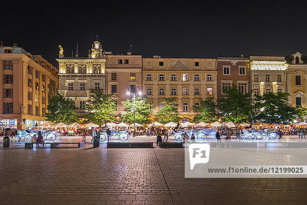 Poland  Krakow  Old town  town houese at main square by night