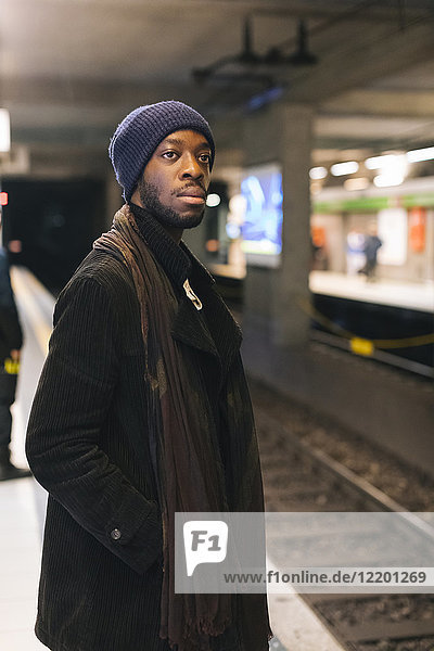 African american man waiting at underground station