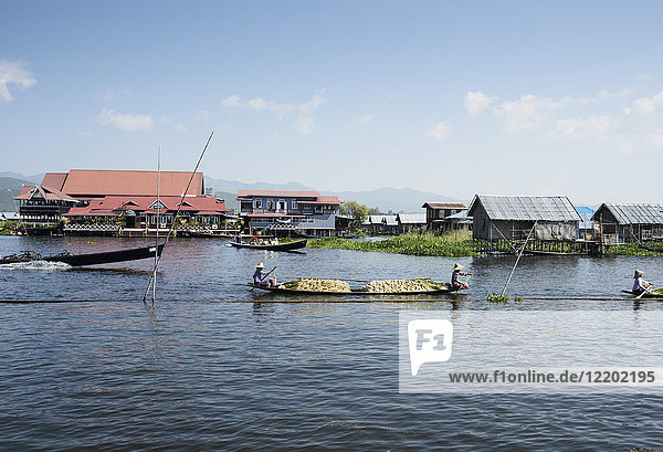 Myanmar  Inle lake  Burmese fisher women selling goods