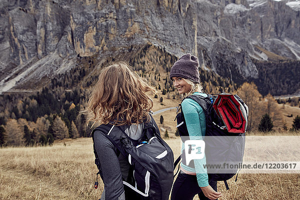 Two young women hiking in the mountains