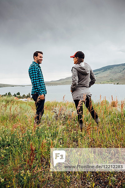 Couple standing beside Dillon Reservoir  Silverthorne  Colorado  USA