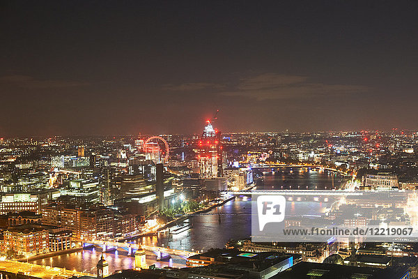 Cityscape of London and river Thames illuminated at night  United Kingdom  Europe