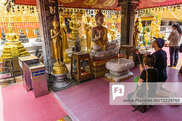 Asia  Thailand  Chiang Mai  Wat Phra That Doi Suthep temple  people praying