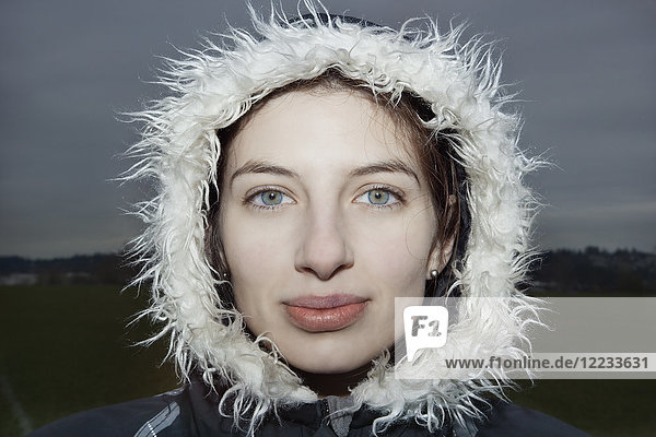 Portrait of a Caucasian woman wearing a winter coat.