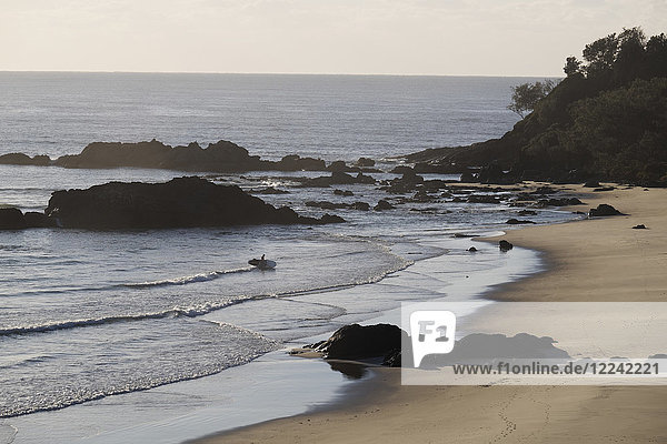 Scenic view of silhouette of surfer on beach at Port Macquarie in New South Wales  Australia