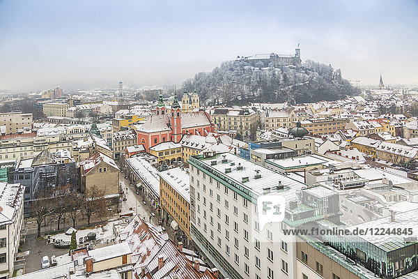 View of snow covered Ljubljana old town and Castle from The Skyscraper  Ljubljana  Slovenia  Europe