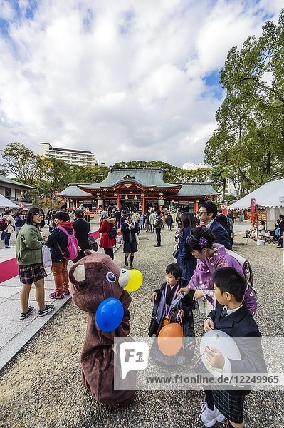 Tourists in front of Ikuta Shrine  Plush Bear  Kobe  Japan  Asia