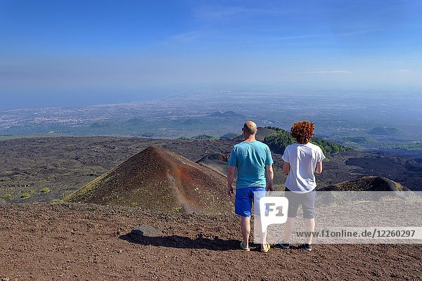View  hikers on their way to the crater Silvestri  volcano Etna  province Catania  Silzilia  Italy  Europe