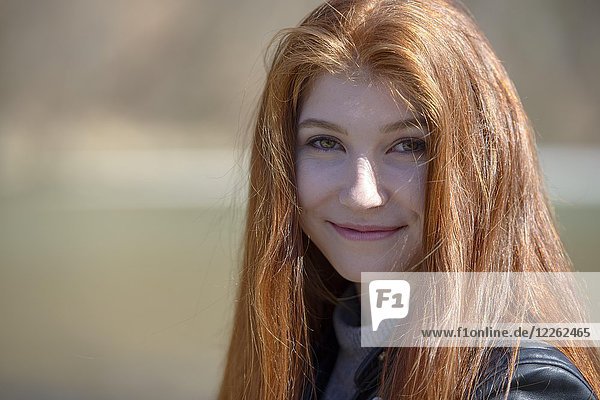 Portrait  young woman  girl  teenager with long red hair  Bavaria  Germany  Europe