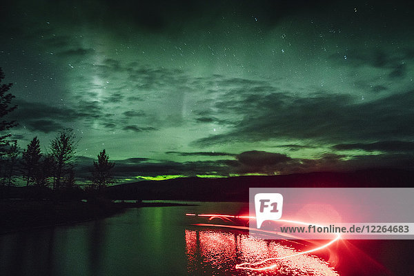 Canada  British Columbia  Boya Lake  Boya Lake Provincial Park  Northern Lights  starry sky at night  light painting