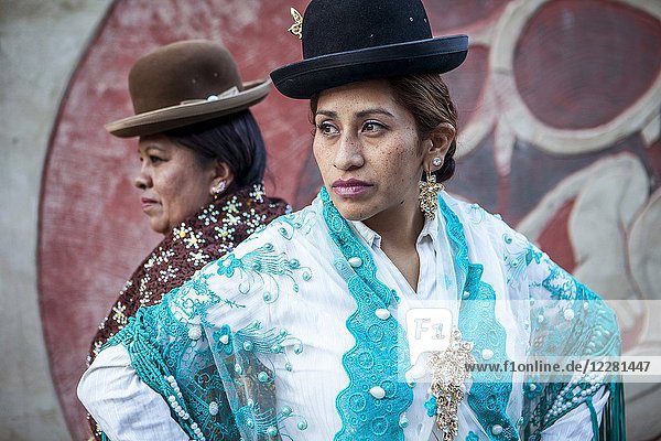 At right Benita la Intocable   at left Angela la Folclorista  cholitas females wrestlers  El Alto  La Paz  Bolivia.