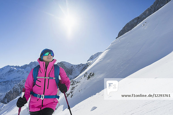 Portrait of a woman skiing
