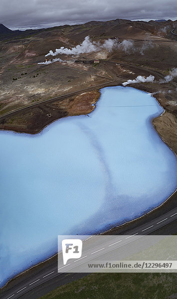 Aerial view of lake by smoke on field  Mývatn  Iceland