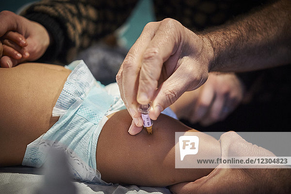 Reportage on a pediatrician who specializes in attachment theory in Lyon  France. Vaccination.
