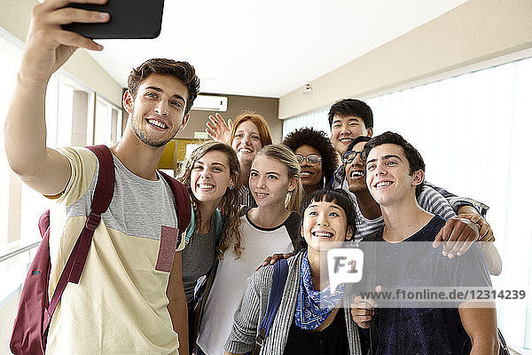 Students posing for group selfie