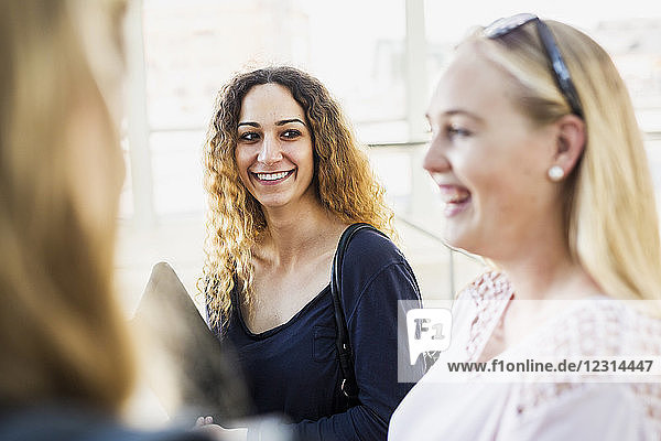 Young women laughing