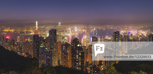 Hong Kong city skyline at night  showing the Central and Kowloon area  viewed from Victoria Peak  Hong Kong  China  Asia
