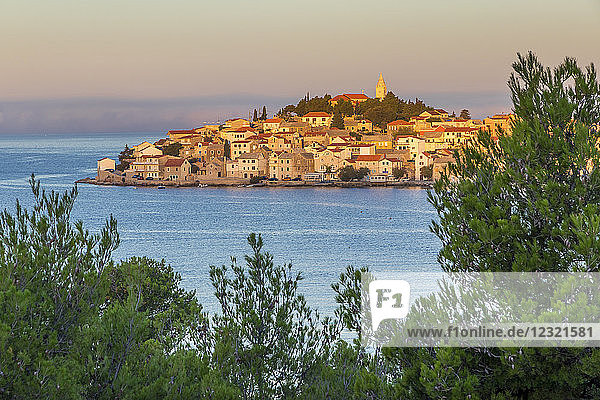 Elevated view over the old town of Primosten  situated on a small island  at sunrise  Croatia  Europe