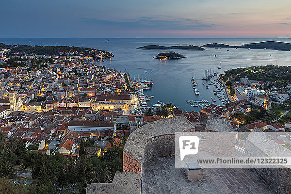 Elevated view over Hvar Town from the Spanish Fortress at dusk  Hvar  Croatia  Europe