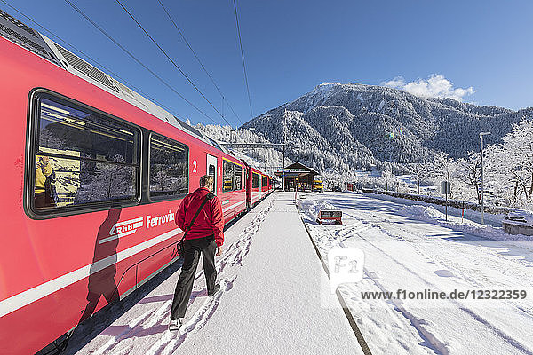 Bernina Express train at Filisur station  Albula Valley  Canton of Graubunden  Switzerland  Europe