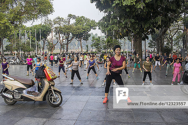 People exercising in the early morning; Hoan Kiem  Hanoi  Vietnam