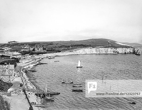 Magic lantern slide circa 1900.Victorian/Edwardian.Social History.Freshwater is a large village and civil parish at the western end of the Isle of Wight  England. Freshwater Bay is a small cove on the south coast of the Island which also gives its name to the nearby part of Freshwater..Freshwater sits at the western end of the region known as the Back of the Wight or the West Wight which is a popular tourist area.[6] Freshwater is close to steep chalk cliffs. It was the birthplace of physicist Robert Hooke and was the home of Poet Laureate Alfred Lord Tennyson.
