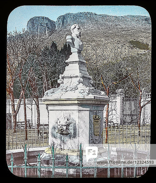 Magic Lantern slide circa 1900. Victorian or Edwardian era. The origional monchrome ( black and white ) photograph hand coloured.The photograph is the work of G.W. Wilson photographer and slide manufacturer 1823-1893.George Washington Wilson (7 February 1823 – 9 March 1893) was a pioneering Scottish photographer. The French Riviera and Monte Carlo (lecture ) .Slide 45 Prince Charles III’s monument Monaco. Charles III (8 December 1818 – 10 September 1889) was Prince of Monaco and Duke of Valentinois from 20 June 1856 to his death. He was the founder of the famous casino in Monte Carlo  as his title in Monegasque and Italian was Carlo III. He was born in Paris Charles Honoré Grimaldi  the only son of Florestan I of Monaco and Maria Caroline Gibert de Lametz.