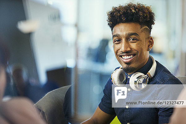 Portrait smiling  confident creative businessman with headphones