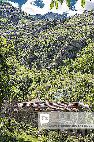 Spain  National park of los Picos de Europa  Bulnes mountains  houses of the Bulnes village  low-angle shot