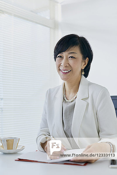 Japanese senior businesswoman in the office