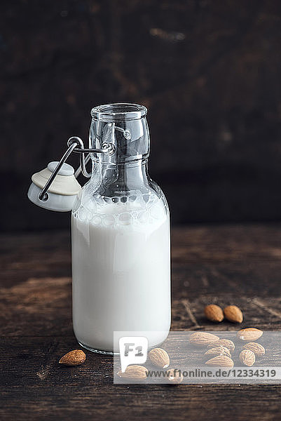Almond milk in swing top bottle