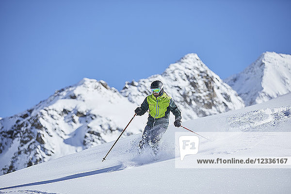 Austria  Tyrol  Kuehtai  man skiing in winter landscape
