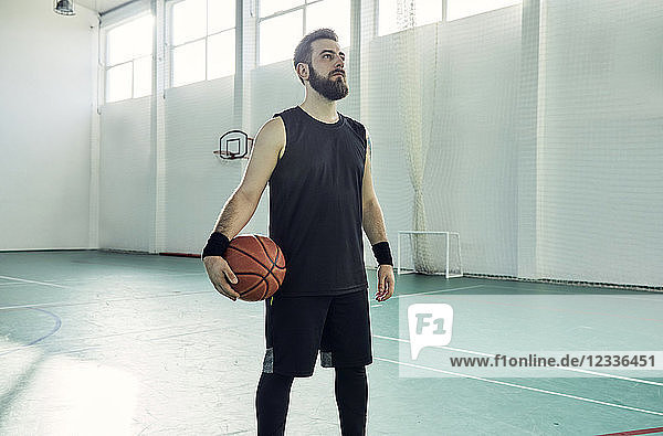 Man with basketball  indoor