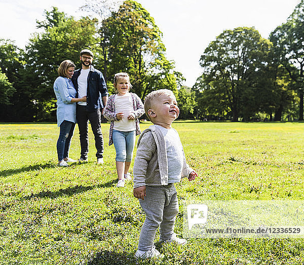 Boy with his family in a park
