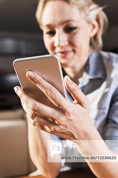 Woman using smartphone  close-up