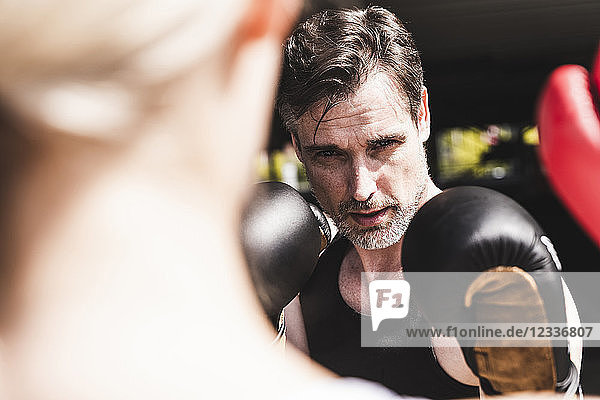 Man and woman in boxing training