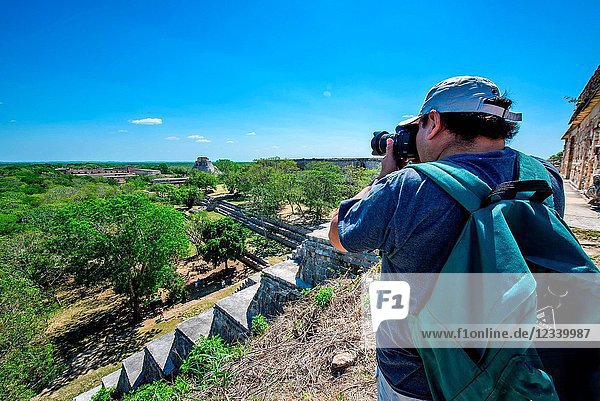 Photographer in Uxmal Archaeological Site Yucatan Province Mexico Central America